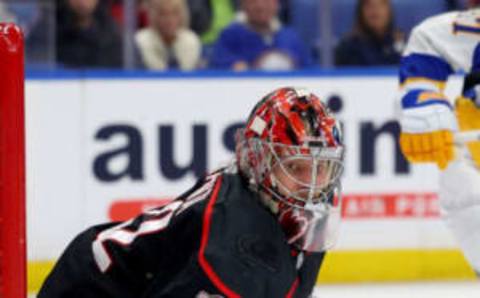 Feb 1, 2023; Buffalo, New York, USA; Carolina Hurricanes goaltender Antti Raanta (32) looks for the puck during the second period against the Buffalo Sabres at KeyBank Center. Mandatory Credit: Timothy T. Ludwig-USA TODAY Sports