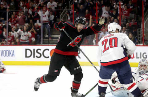 RALEIGH, NC – APRIL 15: Warren Foegele #13 of the Carolina Hurricanes scores a goal and celebrates in Game Three of the Eastern Conference First Round against the Washington Capitals during the 2019 NHL Stanley Cup Playoffs on April 15, 2019 at PNC Arena in Raleigh, North Carolina. (Photo by Gregg Forwerck/NHLI via Getty Images)