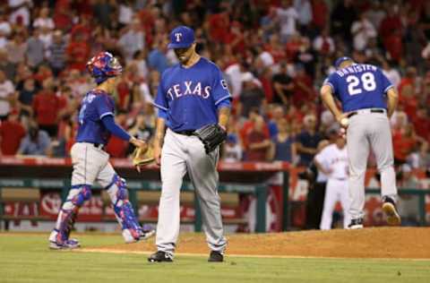 Robinson Chirinos (background) emerged in his 30s as a legitimate big-league catcher. Will the Rangers give him a chance to test the open market?