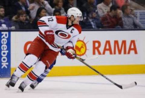 Jan 21, 2016; Toronto, Ontario, CAN; Carolina Hurricanes forward Eric Staal (12) skates against the Toronto Maple Leafs at the Air Canada Centre. Carolina defeated Toronto 1-0 in overtime. Mandatory Credit: John E. Sokolowski-USA TODAY Sports