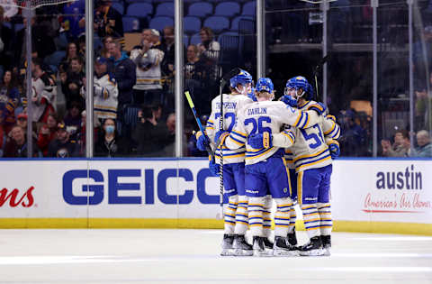 Mar 25, 2022; Buffalo, New York, USA; Buffalo Sabres left wing Jeff Skinner (53) celebrates his goal with teammates during the first period against the Washington Capitals at KeyBank Center. Mandatory Credit: Timothy T. Ludwig-USA TODAY Sports