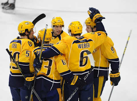 Apr 2, 2016; Nashville, TN, USA; Nashville Predators players celebrate after a goal by defenseman Shea Weber (6) during the first period against the San Jose Sharks at Bridgestone Arena. Mandatory Credit: Christopher Hanewinckel-USA TODAY Sports