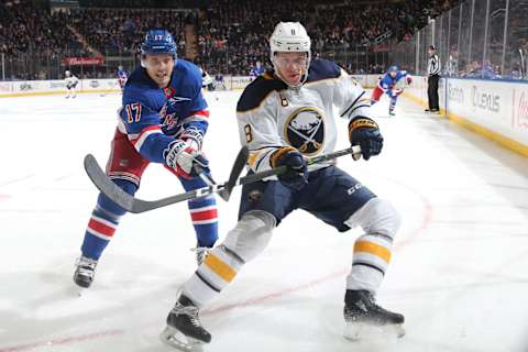 NEW YORK, NY – MARCH 24: Jesper Fast #17 of the New York Rangers skates against Casey Nelson #8 of the Buffalo Sabres at Madison Square Garden on March 24, 2018 in New York City. (Photo by Jared Silber/NHLI via Getty Images)