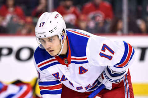 CALGARY, AB – MARCH 15: New York Rangers Right Wing Jesper Fast (17) prepares for a face-off during the first period of an NHL game where the Calgary Flames hosted the New York Rangers on March 15, 2019, at the Scotiabank Saddledome in Calgary, AB. (Photo by Brett Holmes/Icon Sportswire via Getty Images)