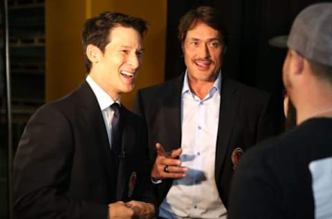 ANAHEIM, CA: NHL Hall of Fame Inductees and former Ducks players Paul Kariya (L) and Teemu Selanne talk with fans prior to the NHL game between the Florida Panthers and the Anaheim Ducks at Honda Center on November 19, 2017. (Photo by Victor Decolongon/Getty Images)