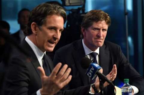 May 21, 2015; Toronto, Ontario, Canada; Toronto Maple Leafs new head coach Mike Babcock listens as club president Brendan Shanahan gestures during comments to the media at a media conference to announce Babcock signing with the club at Air Canada Centre. Mandatory Credit: Dan Hamilton-USA TODAY Sports