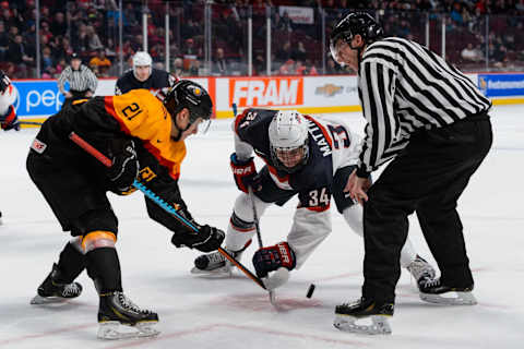 MONTREAL, QC – DECEMBER 28: Dominik Kahun #21 of Team Germany and Auston Matthews #34 of Team United States  . (Photo by Minas Panagiotakis/Getty Images)