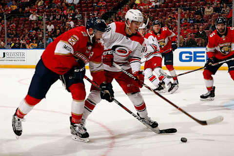 SUNRISE, FL – APRIL 2: Keith Yandle #3 of the Florida Panthers skates for possession against Teuvo Teravainen #86 of the Carolina Hurricanes at the BB&T Center on April 2, 2018 in Sunrise, Florida. (Photo by Eliot J. Schechter/NHLI via Getty Images)