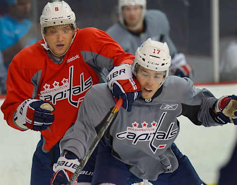 ARLINGTON VA – SEPTEMBER 12: Captials’ Alex Ovechkin, left, challenges Chandler Stephenson, right, for the puck during opening day of the Washington Capitals training camp in Arlington VA , September 12, 2013. (Photo by John McDonnell/The Washington Post via Getty Images)