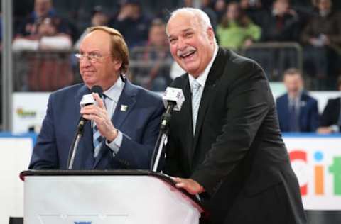 NEW YORK, NY – FEBRUARY 08: Former Rangers color commentator John Davidson (R) and play by play announcer Sam Rosen (L) speak to the crowd prior to the game against Carolina Hurricanes during the 1994 Stanley Cup Anniversary event at Madison Square Garden on February 8, 2019 in New York City. (Photo by Jared Silber/NHLI via Getty Images)