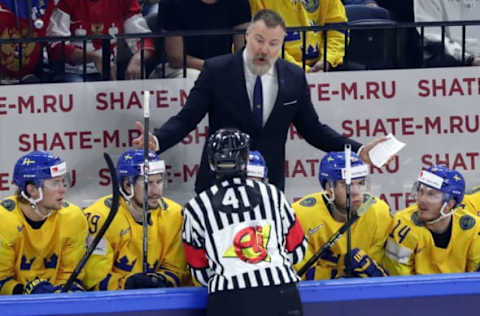 COPENHAGEN, DENMARK – MAY 15, 2018: Team Sweden head coach Rikard Gronborg (back) talks to a referee during the2018 IIHF World Championship Preliminary Round Group A ice hockey match against Russia at Royal Arena. Anton Novoderezhkin/TASS (Photo by Anton NovoderezhkinTASS via Getty Images)