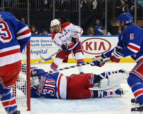 NEW YORK, NY – MAY 02: Henrik Lundqvist #30 of the New York Rangers blocks a shot by Alex Ovechkin #8 of the Washington Capitals during the first period in Game Two of the Eastern Conference Semifinals during the 2015 NHL Stanley Cup Playoffs at Madison Square Garden on May 2, 2015 in New York City. (Photo by Bruce Bennett/Getty Images)