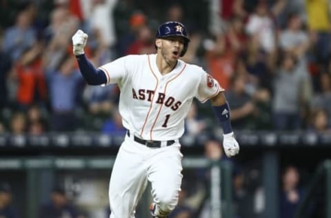 Sep 26, 2016; Houston, TX, USA; Houston Astros shortstop Carlos Correa (1) hits an RBI single during the ninth inning against the Seattle Mariners at Minute Maid Park. Mandatory Credit: Troy Taormina-USA TODAY Sports