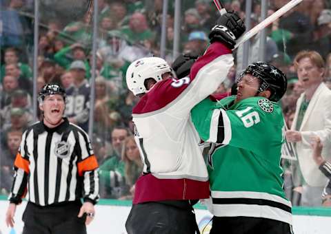 DALLAS, TEXAS – NOVEMBER 05: Nazem Kadri #91 of the Colorado Avalanche checks Joe Pavelski #16 of the Dallas Stars into the glass in the first period at American Airlines Center on November 05, 2019 in Dallas, Texas. (Photo by Tom Pennington/Getty Images)