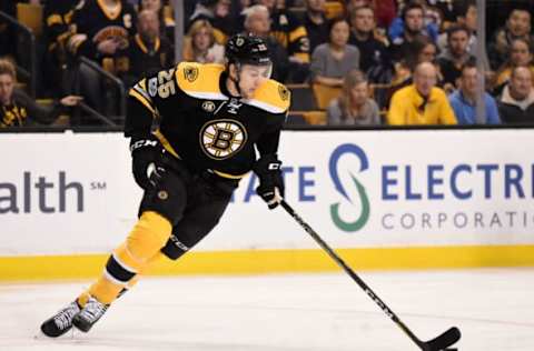 Jan 14, 2017; Boston, MA, USA; Boston Bruins defenseman Brandon Carlo (25) skates with the puck during the first period against the Philadelphia Flyers at TD Garden. Mandatory Credit: Bob DeChiara-USA TODAY Sports