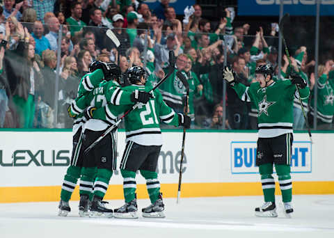 Apr 22, 2016; Dallas, TX, USA; Dallas Stars defenseman Johnny Oduya (47) and left wing Antoine Roussel (21) and defenseman John Klingberg (3) celebrate a goal against the Minnesota Wild in game five of the first round of the 2016 Stanley Cup Playoffs at the American Airlines Center. The Wild defeat the Stars 5-4. Mandatory Credit: Jerome Miron-USA TODAY Sports