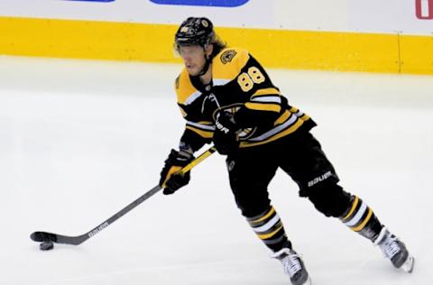 Aug 29, 2020; Toronto, Ontario, CAN; Boston Bruins forward David Pastrnak (88) passes the puck against the Tampa Bay Lightning in game four of the second round of the 2020 Stanley Cup Playoffs at Scotiabank Arena. Mandatory Credit: John E. Sokolowski-USA TODAY Sports