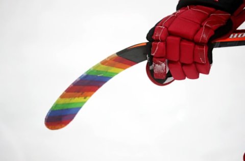 RALEIGH, NC – MARCH 24: Teammates of the Carolina Hurricanes use pride tape to commemorate Hockey is for Everyone during warm ups prior to an NHL game against the Montreal Canadiens on March 24, 2019 at PNC Arena in Raleigh, North Carolina. (Photo by Gregg Forwerck/NHLI via Getty Images)