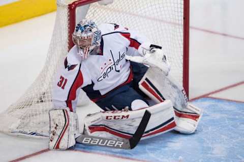 Feb 13, 2016; Dallas, TX, USA; Washington Capitals goalie Philipp Grubauer (31) faces the Dallas Stars attack during the game at the American Airlines Center. The Stars defeat the Capitals 4-3. Mandatory Credit: Jerome Miron-USA TODAY Sports