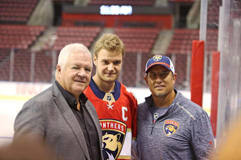 Aleksander Barkov was named as captain of the Florida Panthers on Monday, Sept. 17, 2018. Barkov, middle, with Panthers general manager Dale Tallon, left, and head coach Bob Boughner after the annoucement at the BB&T Center in Sunrise, Fla. (Emily Michot/Miami Herald/TNS via Getty Images)