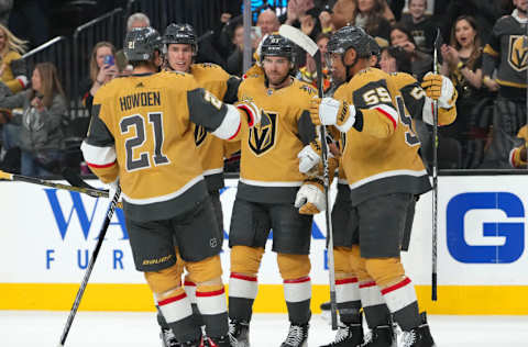 Mar 5, 2023; Las Vegas, Nevada, USA; Vegas Golden Knights defenseman Shea Theodore (27) celebrates with team mates after scoring a goal against the Montreal Canadiens during the first period at T-Mobile Arena. Mandatory Credit: Stephen R. Sylvanie-USA TODAY Sports