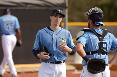 Feb 21, 2016; Port Charlotte, FL, USA; Tampa Bay Rays catcher Curt Casali (19) talks to Rays pitcher Blake Snell (50) at Charlotte Sports Park. Mandatory Credit: Jonathan Dyer-USA TODAY Sports