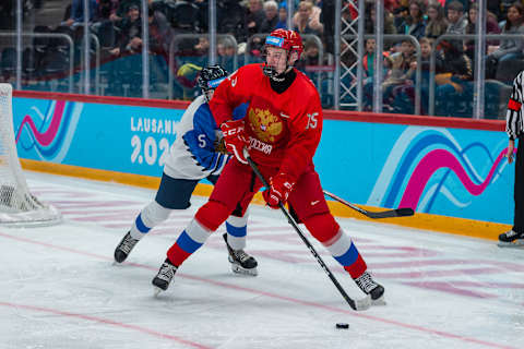 LAUSANNE, SWITZERLAND – JANUARY 21: #15 Kirill Dolzhenkov of Russian Federation in action during Men’s 6-Team Tournament Semifinals Game between Russia and Finland of the Lausanne 2020 Winter Youth Olympics on January 20, 2021 in Lausanne, Switzerland. (Photo by RvS.Media/Monika Majer/Getty Images)