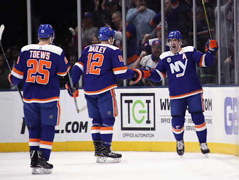 Cal Clutterbuck #15 of the New York Islanders scores on the power-play. (Photo by Bruce Bennett/Getty Images)