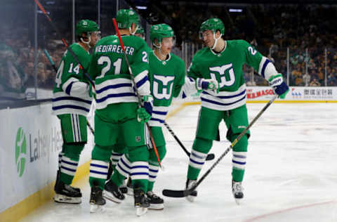 BOSTON, MASSACHUSETTS – MARCH 05: Sebastian Aho #20 of the Carolina Hurricanes celebrates with Nino Niederreiter #21 of the Carolina Hurricanes, Justin Williams #14 and Brett Pesce #22 of the Carolina Hurricanes after scoring a goal during the second period at TD Garden on March 05, 2019, in Boston, Massachusetts. (Photo by Maddie Meyer/Getty Images)