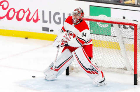 BOSTON, MA – MAY 12: Carolina Hurricanes goalie Petr Mrazek (34) makes a save before Game 2 of the Stanley Cup Playoffs Eastern Conference Finals between the Boston Bruins and the Carolina Hurricanes on May 12, 2019, at TD Garden in Boston, Massachusetts. (Photo by Fred Kfoury III/Icon Sportswire via Getty Images)