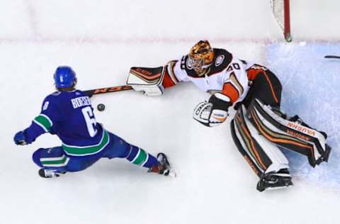 VANCOUVER, BC – JANUARY 2: Brock Boeser #6 of the Vancouver Canucks takes a shot against Ryan Miller #30 of the Anaheim Ducks during their NHL game at Rogers Arena January 2, 2018, in Vancouver, British Columbia, Canada. The Anaheim Ducks won 5-0. (Photo by Jeff Vinnick/NHLI via Getty Images)