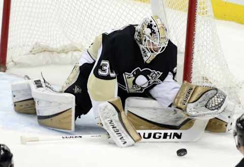 Dec 21, 2015; Pittsburgh, PA, USA; Pittsburgh Penguins goalie Matt Murray (30) makes a save against the Columbus Blue Jackets during the second period at the CONSOL Energy Center. The Penguins won 5-2. Mandatory Credit: Charles LeClaire-USA TODAY Sports