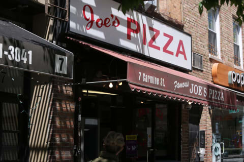 NEW YORK, NEW YORK – MAY 12: A view of Joe’s Pizza on May 12, 2020 in New York City. COVID-19 has spread to most countries around the world, claiming over 291,000 lives with infections of over 4.3 million people. (Photo by Rob Kim/Getty Images)