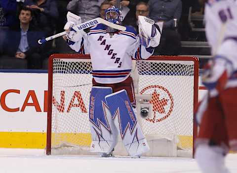 Jan 19, 2017; Toronto, Ontario, CAN; New York Rangers goaltender Henrik Lundqvist (30) reacts after a win over the Toronto Maple Leafs at the Air Canada Centre. New York defeated Toronto 5-2. Mandatory Credit: John E. Sokolowski-USA TODAY Sports