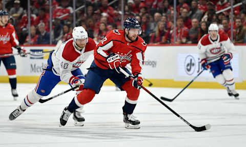 WASHINGTON, DC – NOVEMBER 15: Capitals center Evgeny Kuznetsov (92) stickhandles during the Montreal Canadiens vs. Washington Capitals game November 15, 2019 at Capital One Arena in Washington, D.C.. (Photo by Randy Litzinger/Icon Sportswire via Getty Images)