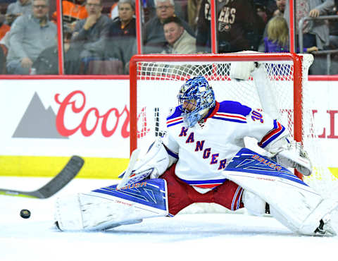 Jan 4, 2017; Philadelphia, PA, USA; New York Rangers goalie Henrik Lundqvist (30) makes a save against the Philadelphia Flyers during the second period at Wells Fargo Center. Mandatory Credit: Eric Hartline-USA TODAY Sports