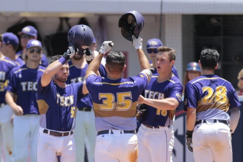 OXFORD, MS – JUNE 04: OXFORD, MS – Tennessee Tech Golden Eagles first baseman Chase Chambers (35) is met by his teammates after scoring a home run during the Tennessee Tech Golden Eagles versus Mississippi Rebels game on June 4, 2018, at Oxford-University Stadium, Oxford, MS. (Photo by Bobby McDuffie/Icon Sportswire via Getty Images)