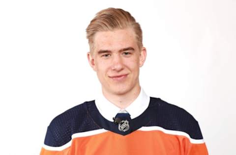 DALLAS, TX – JUNE 23: Ryan McLeod poses after being selected 40th by the Edmonton Oilers during the 2018 NHL Draft at American Airlines Center on June 23, 2018 in Dallas, Texas. (Photo by Tom Pennington/Getty Images)