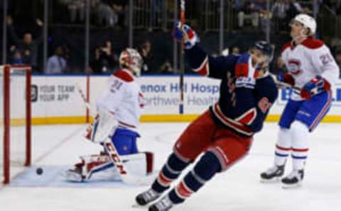 Feb 21, 2017; New York, NY, USA; New York Rangers right wing Rick Nash (61) celebrates scoring a goal during the second period past Montreal Canadiens goalie Carey Price (31) at Madison Square Garden. Mandatory Credit: Adam Hunger-USA TODAY Sports