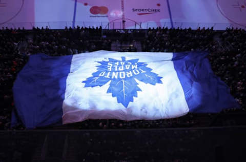 Jan 23, 2017; Toronto, Ontario, CAN; A large Toronto Maple Leafs flag is carried across the stands by fans before the start of the Toronto Maple Leafs game against the Calgary Flames at Air Canada Centre. The Maple Leafs beat the Flames 4-0. Mandatory Credit: Tom Szczerbowski-USA TODAY Sports