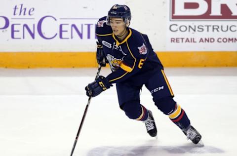 ST CATHARINES, ON – OCTOBER 11: Ryan Suzuki #61 of the Barrie Colts skates with the puck during the second period of an OHL game against the Niagara IceDogs at Meridian Centre on October 11, 2018 in St Catharines, Canada. (Photo by Vaughn Ridley/Getty Images)