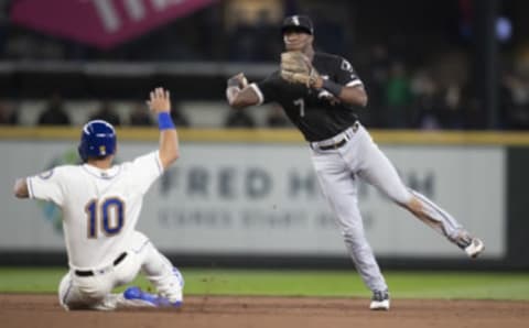 Shortstop Tim Anderson  of the Chicago White Sox turns a double play. (Photo by Stephen Brashear/Getty Images)