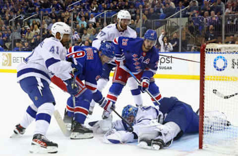 NEW YORK, NEW YORK – OCTOBER 11: Andrei Vasilevskiy #88 of the Tampa Bay Lightning makes the save on Jacob Trouba #8 of the New York Rangers at Madison Square Garden during the season-opening game on October 11, 2022, in New York City. The Rangers defeated the Lightning 3-1. (Photo by Bruce Bennett/Getty Images)