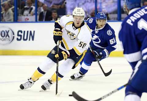 Nashville Predators left wing Vladislav Kamenev (50) skates with the puck as Tampa Bay Lightning center Valtteri Filppula (51) chases. Mandatory Credit: Kim Klement-USA TODAY Sports