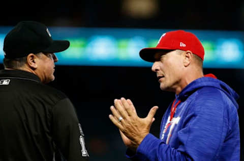 ARLINGTON, TX – SEPTEMBER 29: Manager Jeff Banister #28 of the Texas Rangers has a discussion with umpire Tony Randazzo #11 as the Rangers play the Oakland Athletics during the third inning at Globe Life Park in Arlington on September 29, 2017 in Arlington, Texas. (Photo by Ron Jenkins/Getty Images)