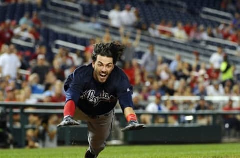 Sep 6, 2016; Washington, DC, USA; Atlanta Braves shortstop Dansby Swanson (2) dives home to score an inside the park home run against the Washington Nationals during the second inning at Nationals Park. Mandatory Credit: Brad Mills-USA TODAY Sports