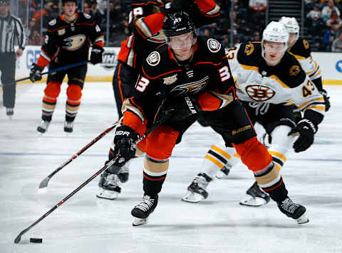 ANAHEIM, CA – FEBRUARY 15: Jakob Silfverberg #33 of the Anaheim Ducks skates with the puck with pressure from Danton Heinen #43 of the Boston Bruins during the game on February 15, 2019, at Honda Center in Anaheim, California. (Photo by Debora Robinson/NHLI via Getty Images)