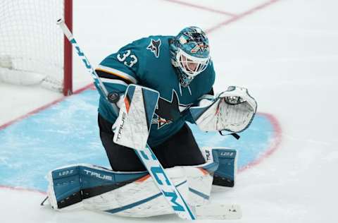 Jan 15, 2022; San Jose, California, USA; San Jose Sharks goaltender Adin Hill (33) makes a save during the third period against the Pittsburgh Penguins at SAP Center at San Jose. Mandatory Credit: Darren Yamashita-USA TODAY Sports