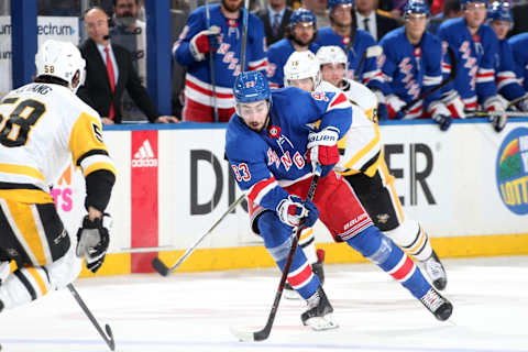 NEW YORK, NY – MARCH 14: Mika Zibanejad #93 of the New York Rangers skates with the puck against the Pittsburgh Penguins at Madison Square Garden on March 14, 2018 in New York City. The New York Rangers won 4-3 in overtime. (Photo by Jared Silber/NHLI via Getty Images)