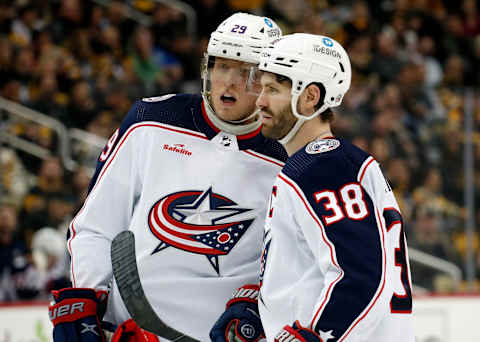 Mar 7, 2023; Pittsburgh, Pennsylvania, USA; Columbus Blue Jackets left wing Patrik Laine (29) and center Boone Jenner (38) talk before a face-off against the Pittsburgh Penguins during the third period at PPG Paints Arena. Pittsburgh won 5-4 in overtime. Mandatory Credit: Charles LeClaire-USA TODAY Sports